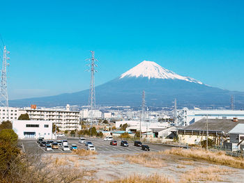 Scenic view of mountains against clear blue sky