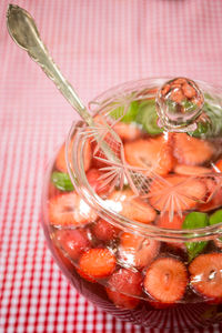 Close-up of fruits in glass jar