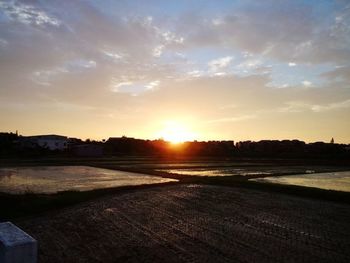 Scenic view of sunset over landscape