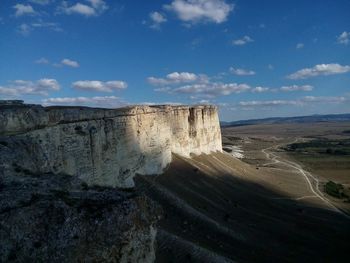 View of landscape against cloudy sky