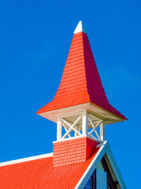 Low angle view of building against blue sky