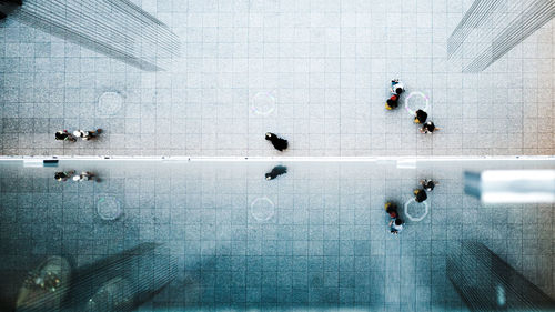 Full length of man standing on tiled floor