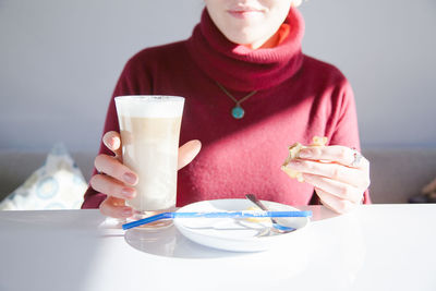 Woman drinking coffee