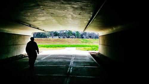 Woman in tunnel