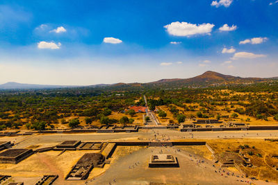 High angle view of road amidst landscape against sky