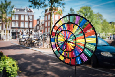 Close-up of colorful pinwheel toy by street