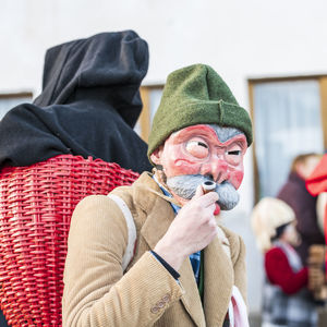 Carnival in carnia. sauris, masks of the religious and pagan tradition. italy