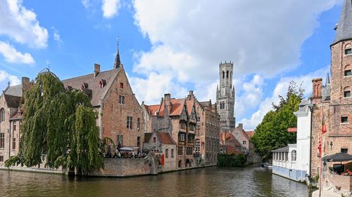 Buildings in city against sky