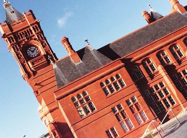 LOW ANGLE VIEW OF A CLOCK TOWER