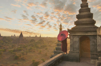 View of temple against sky during sunset