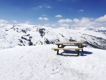 Scenic view of snowcapped mountain against sky during winter