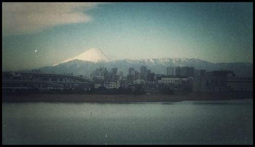 View of river with buildings in background
