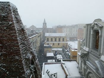 City against clear sky during winter