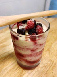 Close-up of strawberries in glass on table