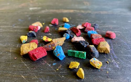 High angle view of multi colored candies on table