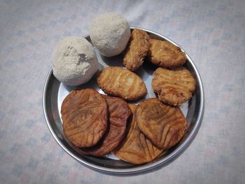 High angle view of cookies in plate on table