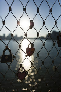 Full frame shot of chainlink fence against sky