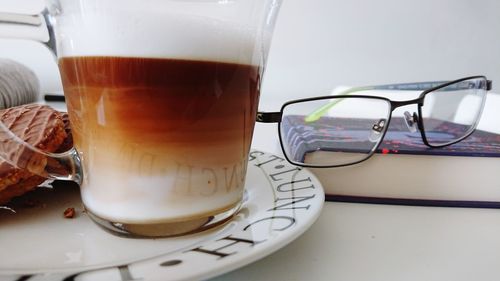 Close-up of coffee cup on table