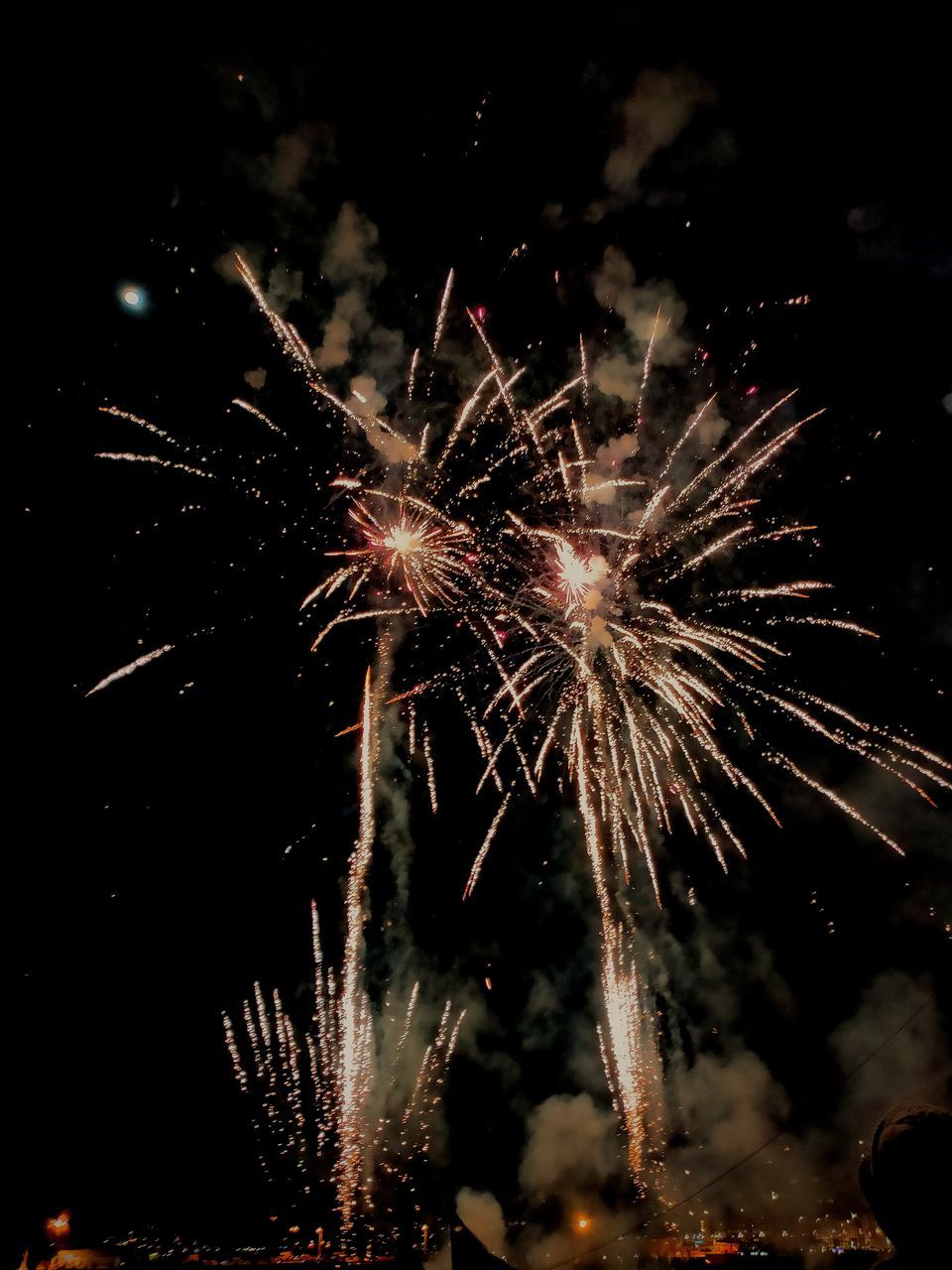 fireworks, celebration, motion, event, night, firework display, illuminated, exploding, arts culture and entertainment, firework - man made object, glowing, long exposure, nature, no people, smoke, burning, blurred motion, sky, recreation, outdoors, new year's eve, low angle view, fire