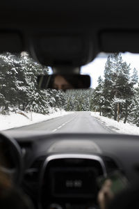 View of car on road in winter