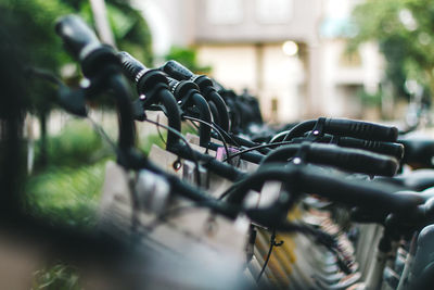 Close-up of bicycle parked on street