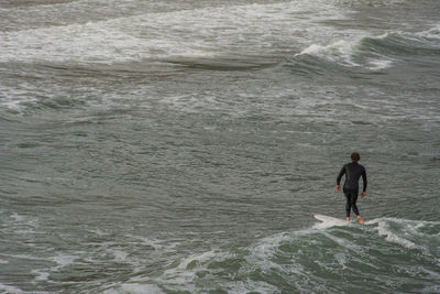 Man surfing in sea