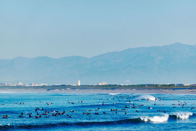 Scenic view of sea against clear blue sky