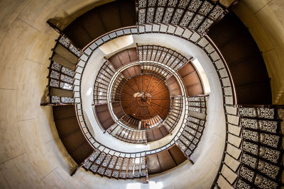 Directly below shot of spiral staircase in building