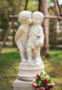 Close-up of angel statue in park