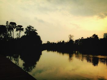 Scenic view of lake at sunset