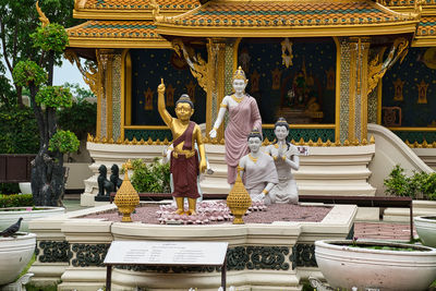 Statue in temple outside building