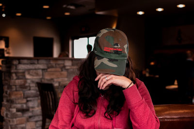 Portrait of a woman wearing hat