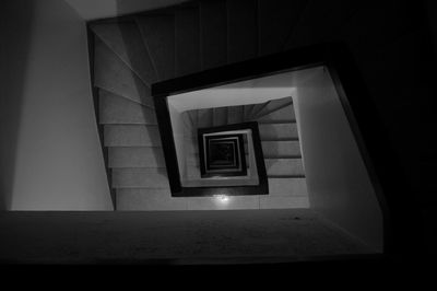 Low angle view of spiral staircase of building