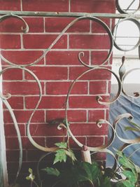 Close-up of red brick wall