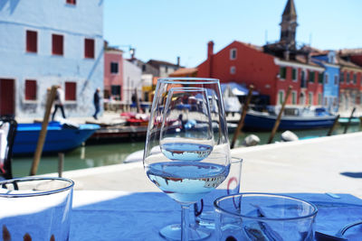 Close-up of wine glasses on table at restaurant