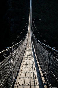 View of footbridge at night