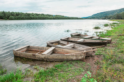 Four wooden boats . moored fishing boats