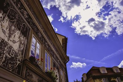 Low angle view of building against blue sky