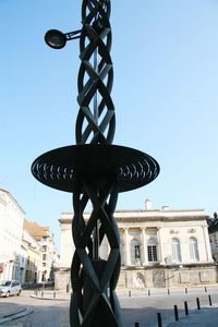 Low angle view of statue against clear sky