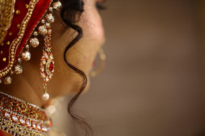 Close-up of woman wearing jewelry in party