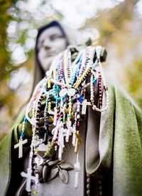 Close-up of buddha in traditional clothing