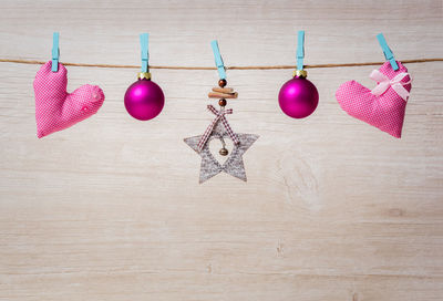 Close-up of christmas decoration hanging on table