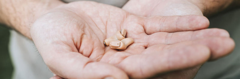 Close-up of woman holding hands