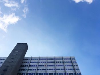 Low angle view of modern building against sky