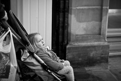 Woman looking at window