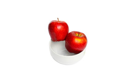 Close-up of apple against white background