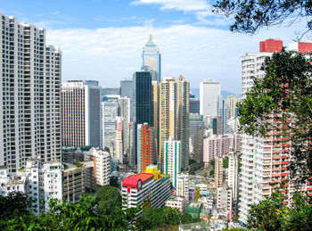 Modern buildings in city against sky