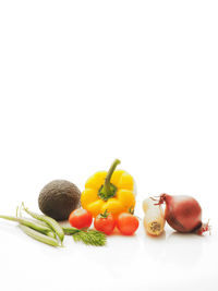 Close-up of fruit over white background