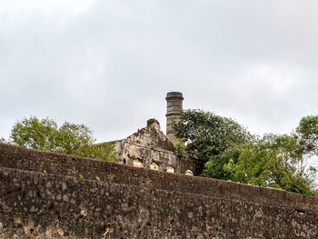 Low angle view of fort against sky