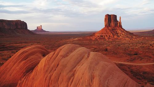 Panoramic view of rock formations on landscape against sky